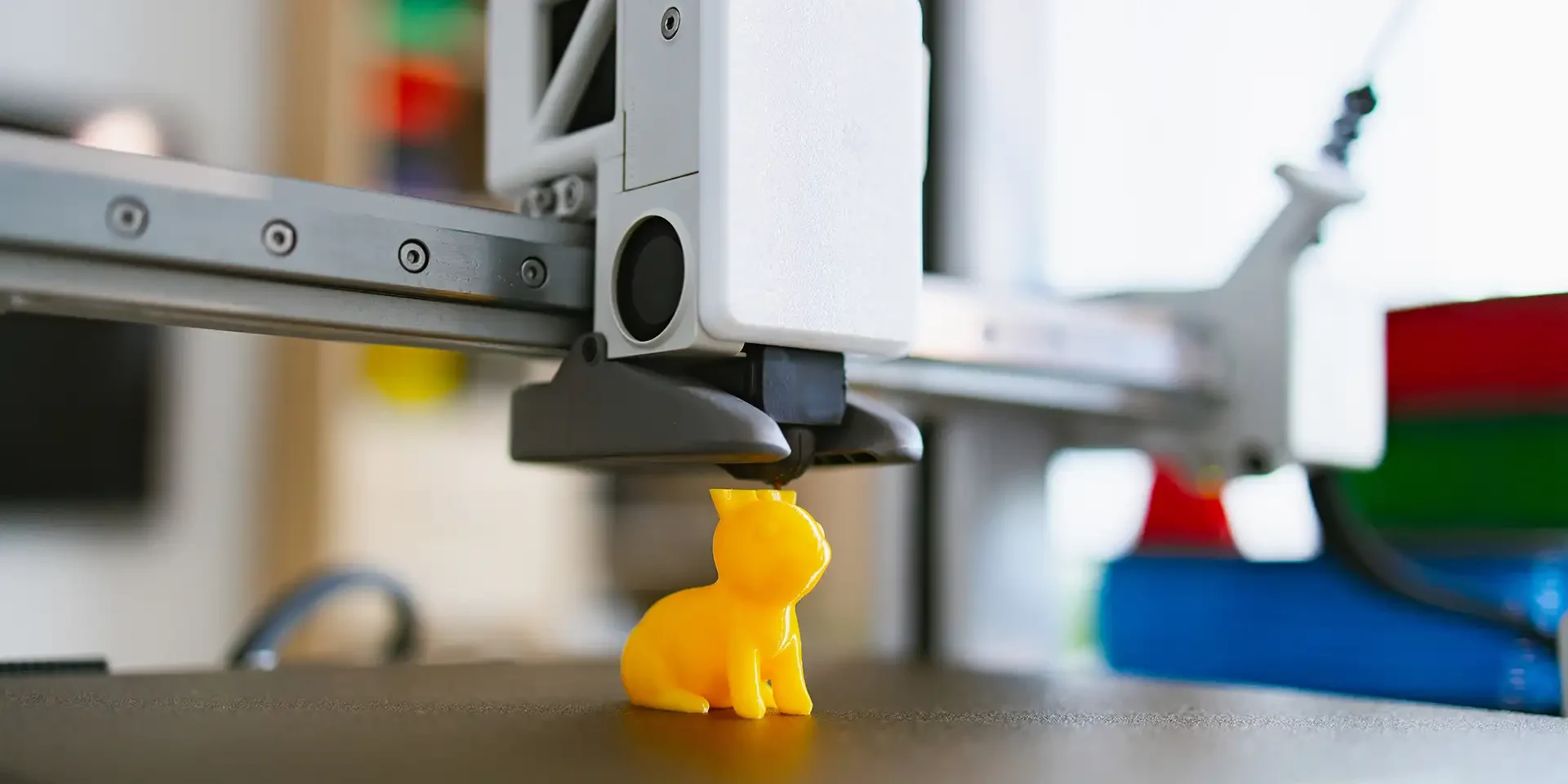 3d-printing-stk-3d-printing-a-yellow-cat-figurine-2026-04-01-16-54-50-utc