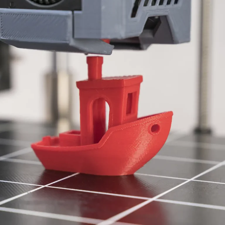 3d-printing-stk-red-3d-printed-boat-is-created-on-a-printing-bed-w-2026-01-09-11-54-25-utc