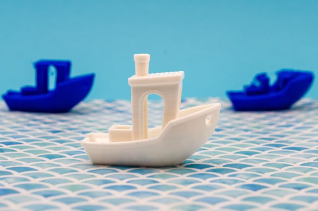 benchy-boats-1920 3D Benchy boats printed in multiple colors showing popular FDM calibration print