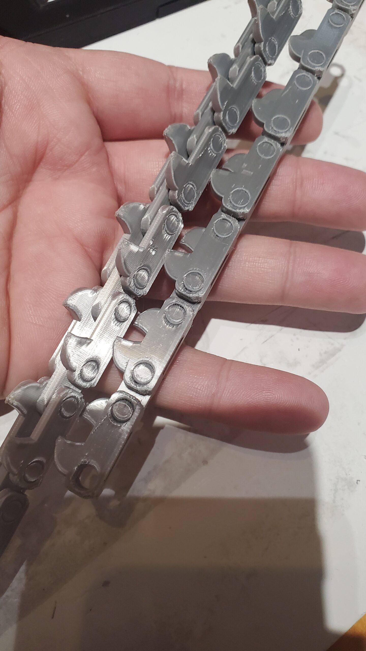 Lollipop Chainsaw Chain Links - Long Link Version OreKo Lollipop Chainsaw chain links 3D printed showing long link version for straight chainsaw sections