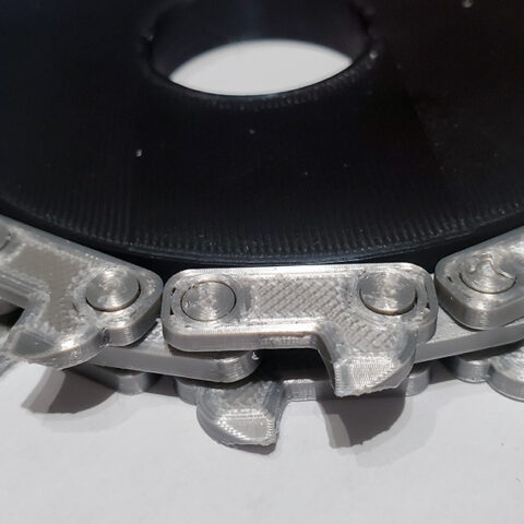 OreKo Lollipop Chainsaw perfect fit chain links showing flat version assembled with precise joint tolerances