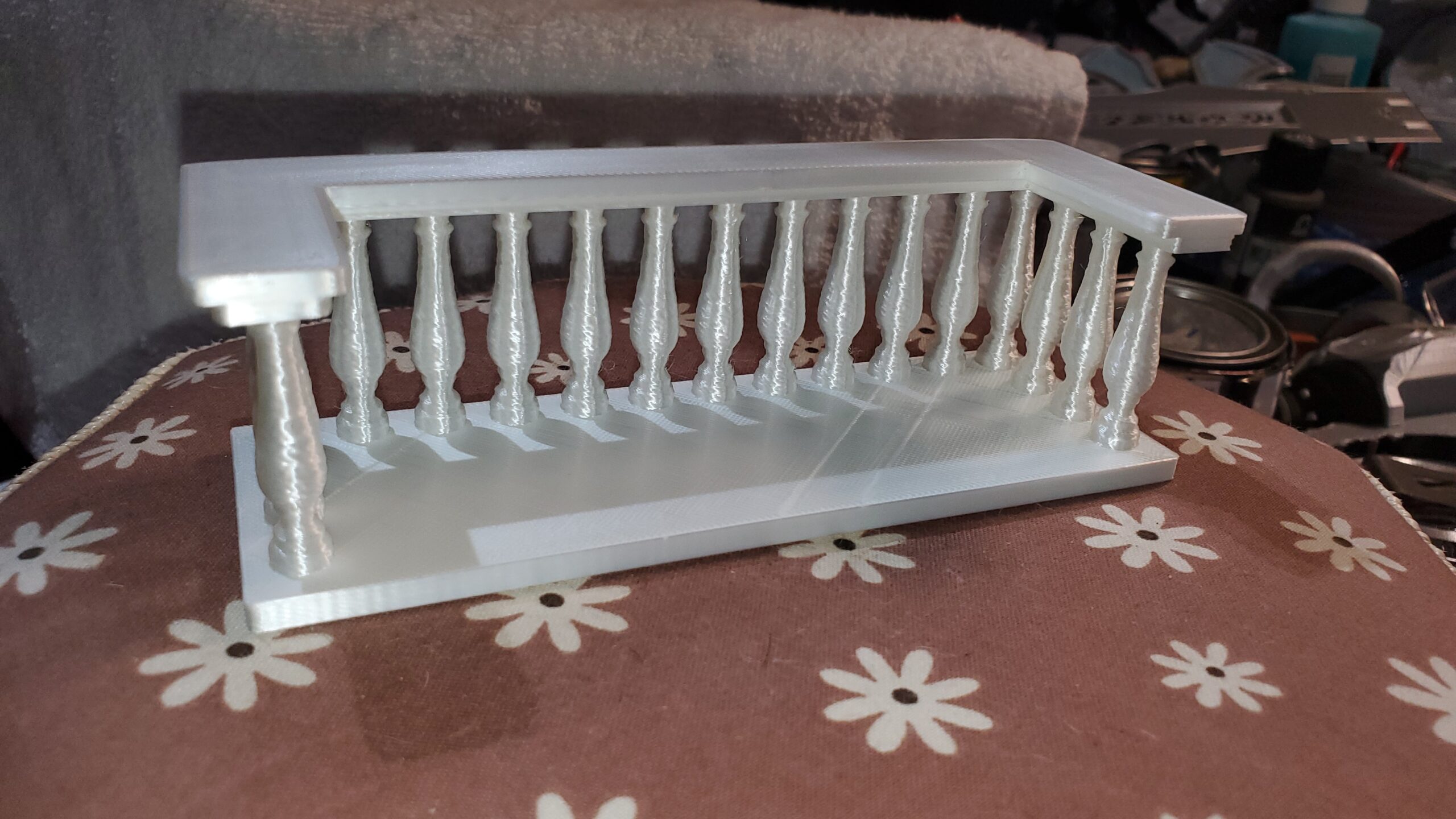 OreKo dollhouse balcony railing set showing side view of assembled porch railing for 1:12 scale dollhouse
