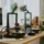 FDM 3D printing machines on office desk near computer workstation