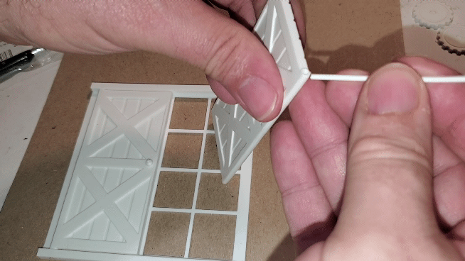 Animated GIF showing assembly process for OreKo miniature window shutters using 1.75mm filament hinge pin
