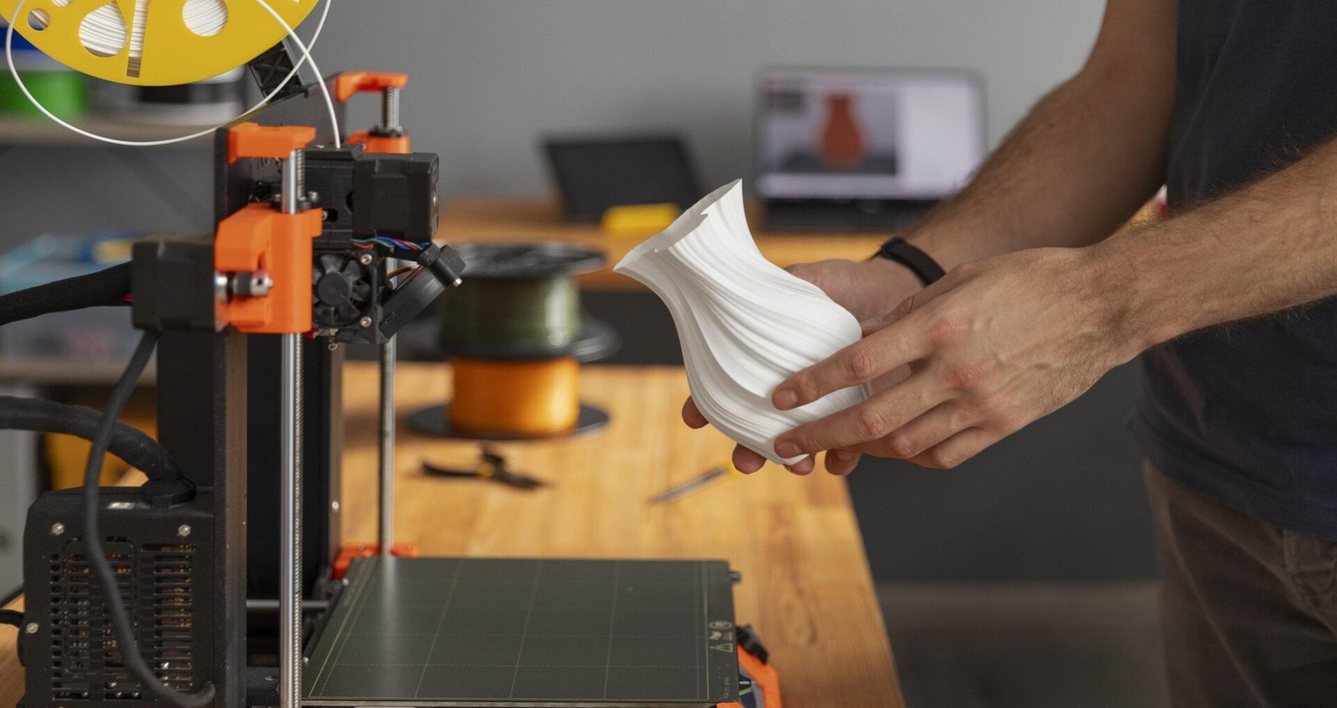 Silk PLA vase printed in smooth glossy finish showcasing material surface quality
