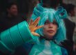 Cosplay prop maker in detailed costume at convention or event
