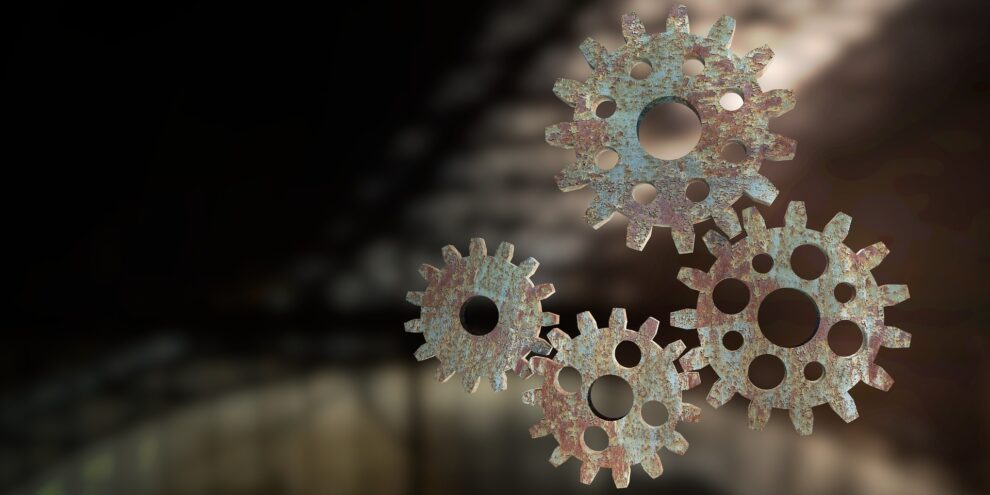 Steampunk gears representing mechanical 3D printing and living hinge movement
