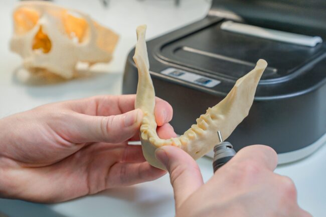 sls-printer SLS selective laser sintering industrial 3D printer in professional workshop